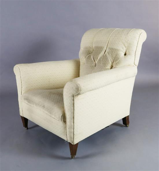 A Howard and Sons club armchair,